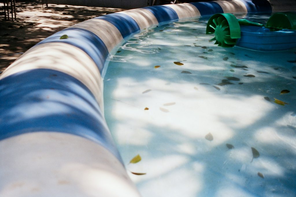 Dirt and debris settled on a pool floor